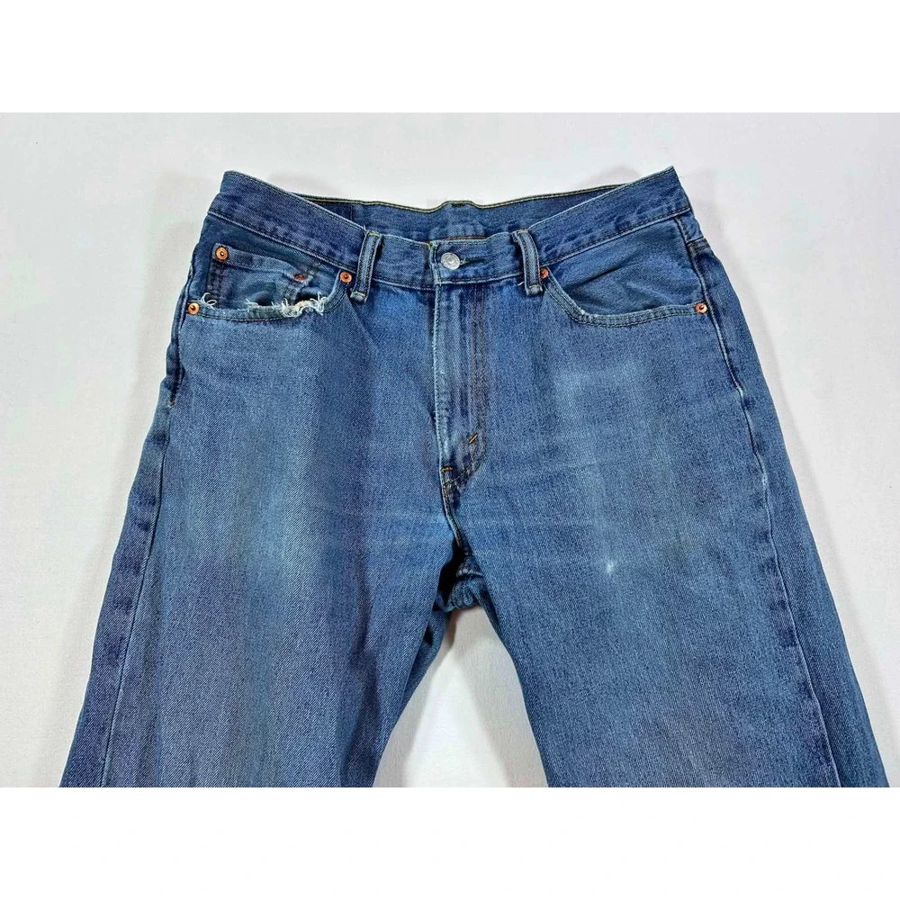 Levis 550 Relaxed Fit Tapered Leg Jeans Mens 33x32 Medium Blue Distressed Denim